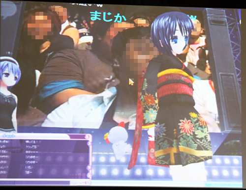 メタバースのスクリーンに大会議の中継動画
