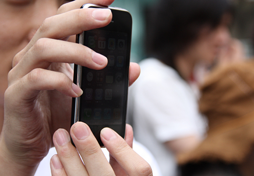 その手には、iPhone