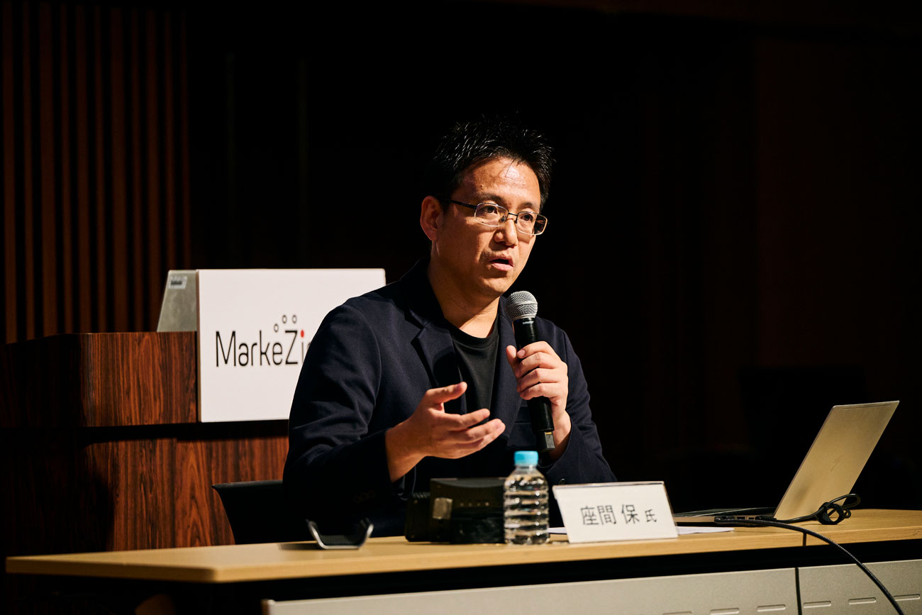 株式会社エートゥジェイ　マーケティング統括部 部長兼執行役員　座間保氏