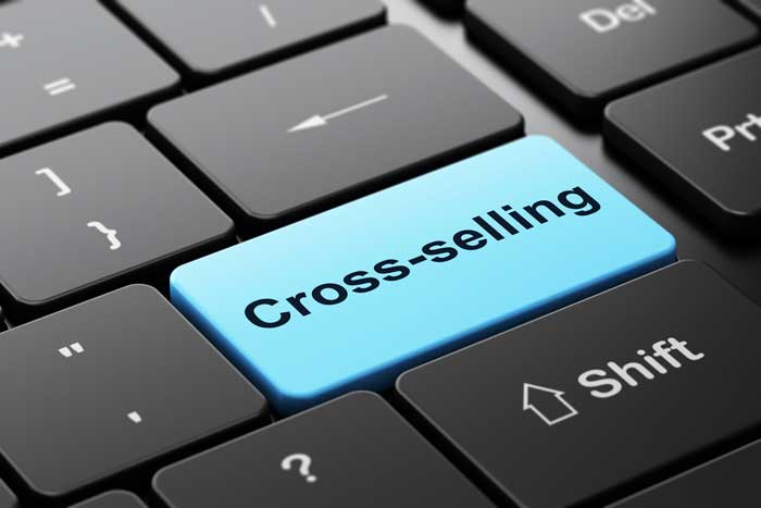 Business concept Cross-Selling on computer keyboard background