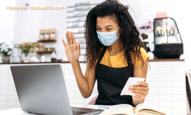 waitress or small business owner talks by video call