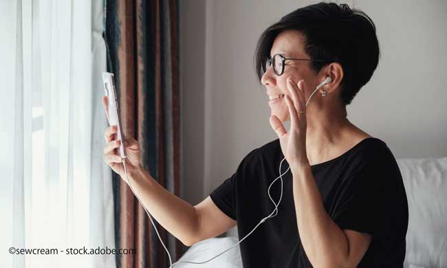 woman making facetime video calling with smartphone, using zoom meeting online app, work from home, working remotely, social distancing, new normal