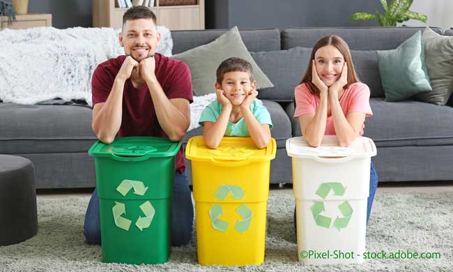 Family with containers for garbage at home. Concept of recycling