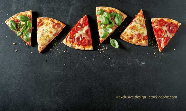 Portions of different tasty oven-fired pizzas