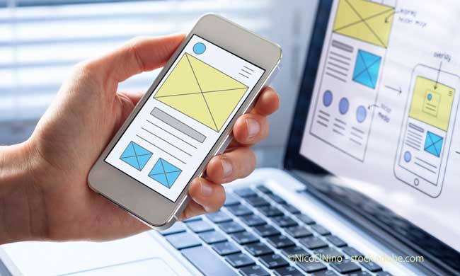Mobile responsive website development, wireframe design preview on smartphone screen