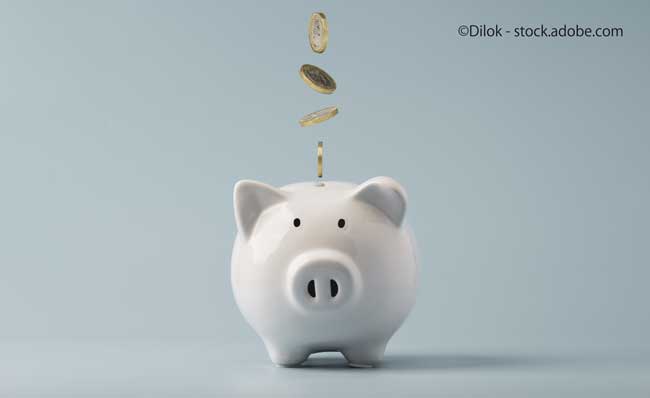 Coins falling to white piggy saving , Financial and money deposit concept