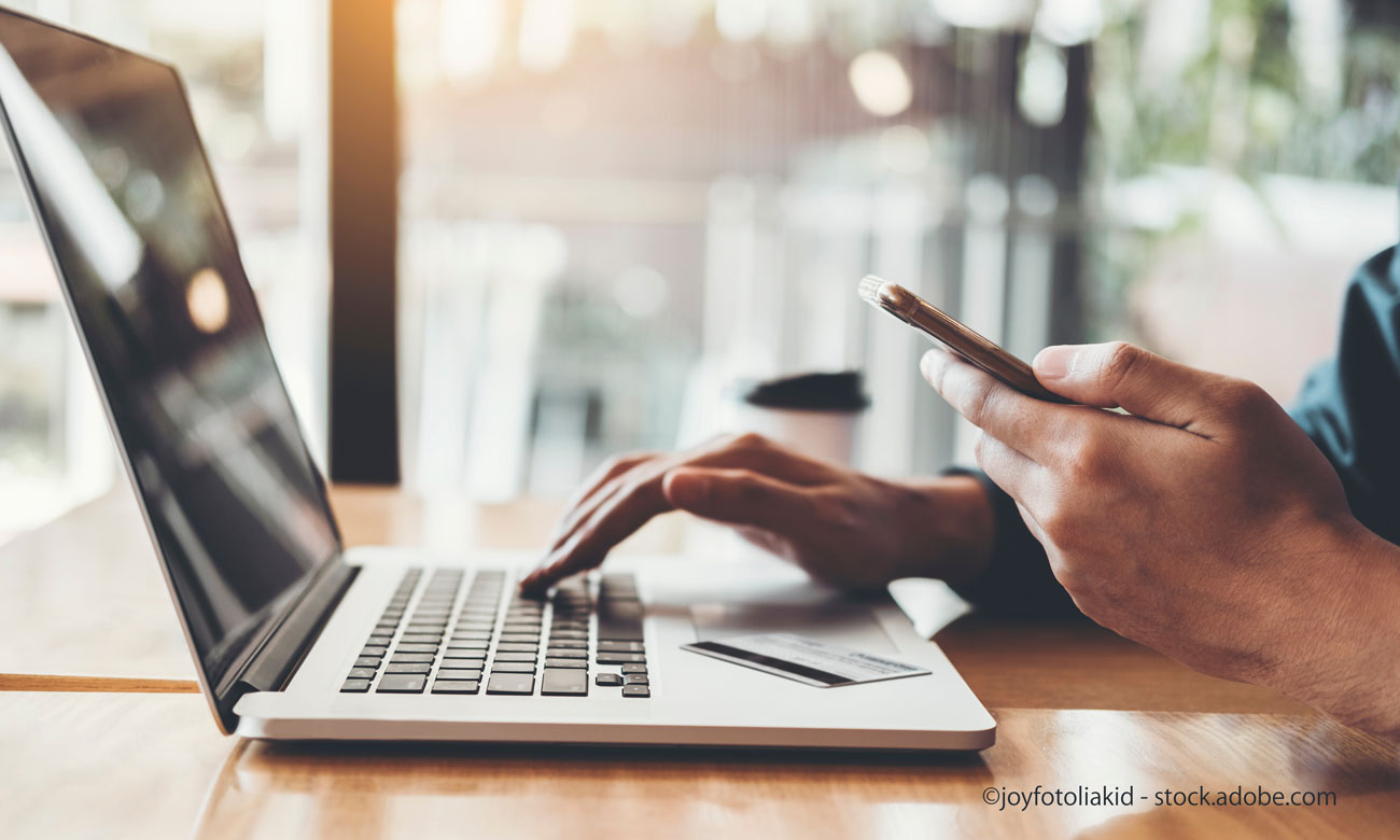 businessman using Laptop with credit card Shopping online