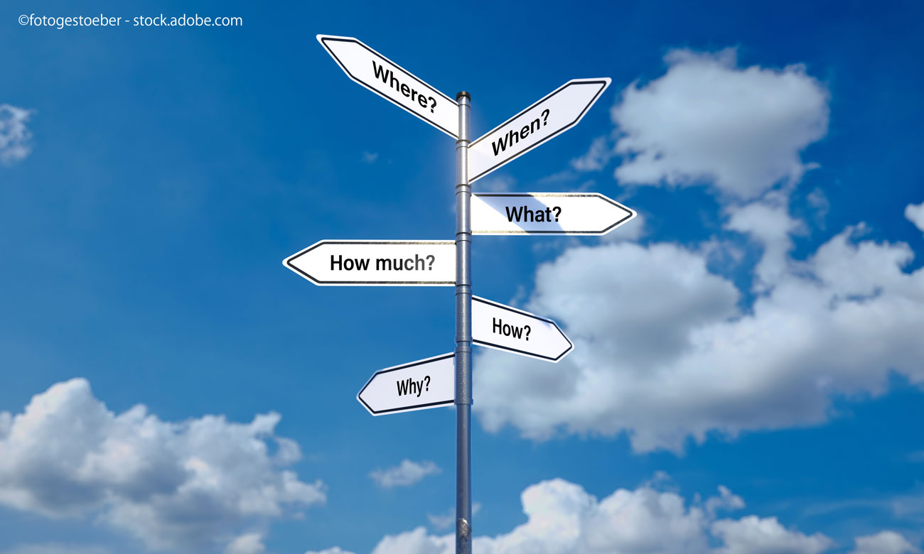 signpost with 6 arrow-shaped signs showing the words WHERE, WHEN, WHAT, HOW MUCH, HOW and WHY in different directions in front of a cloudy sky