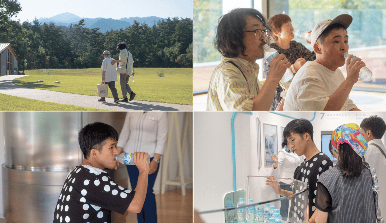 作家と家族が向上を見学したり、サントリー天然水を飲んでいる写真です